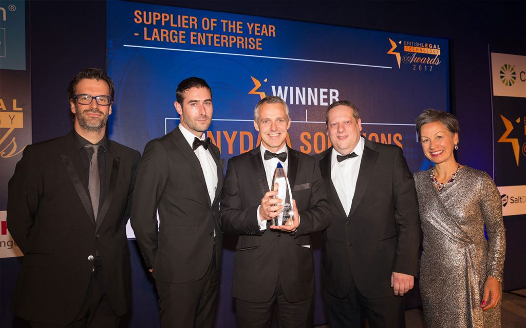 Photo of the AnyData team winning Supplier of the Year at the 2017 British Technology Awards